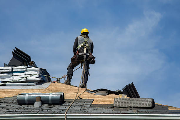 Professional Gutter Installation technician working in Manhasset, NY